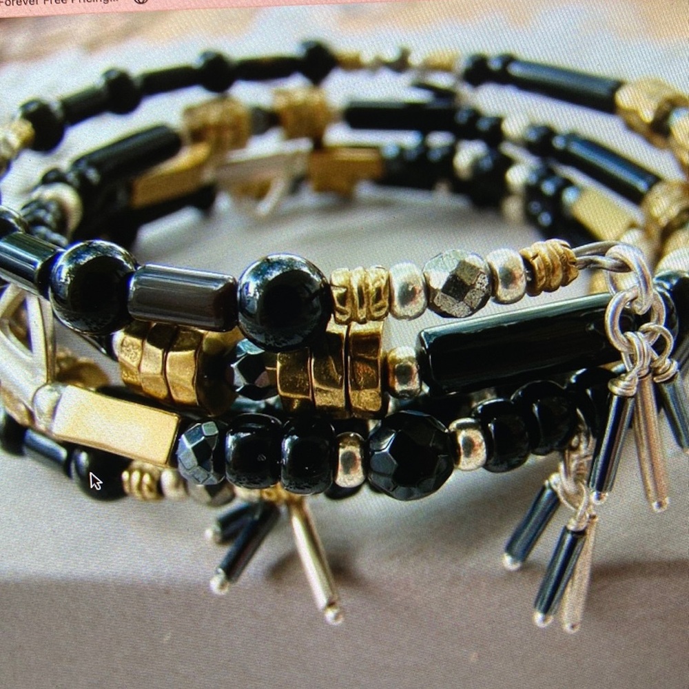 Silpada sterling silver, hematite and pyrite wrap bracelet.